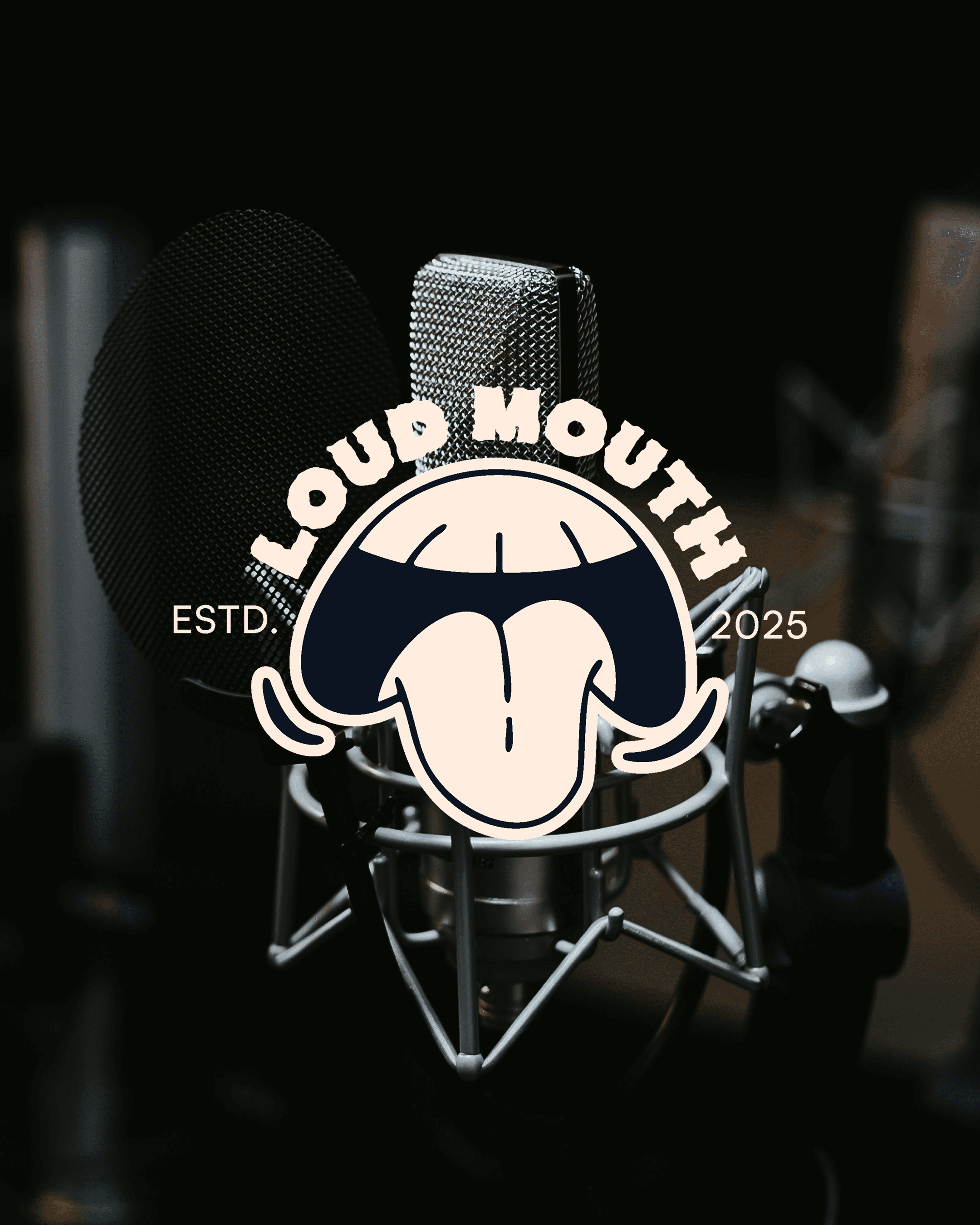 Loud Mouth badge lockup over a studio microphone